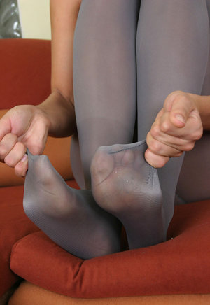 Saucy beauty in white pantyhose gets creamed all over her hairy bush